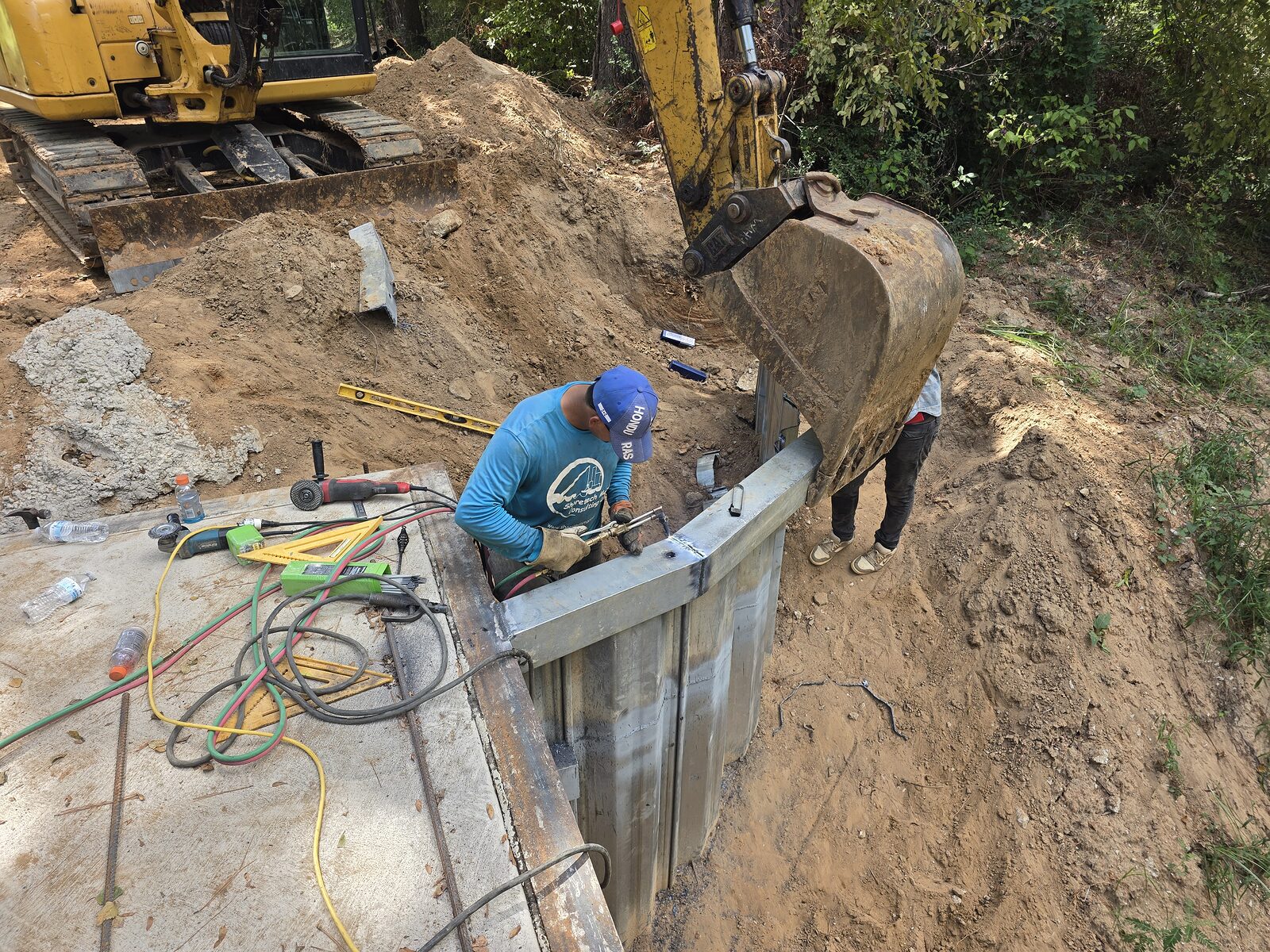 Shore Tech crew installing a steel sheet-pile bulkhead