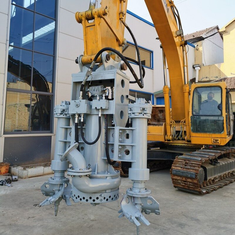 Excavator-mounted hydraulic dredge head used to restore depth inside boat slips and under boathouses